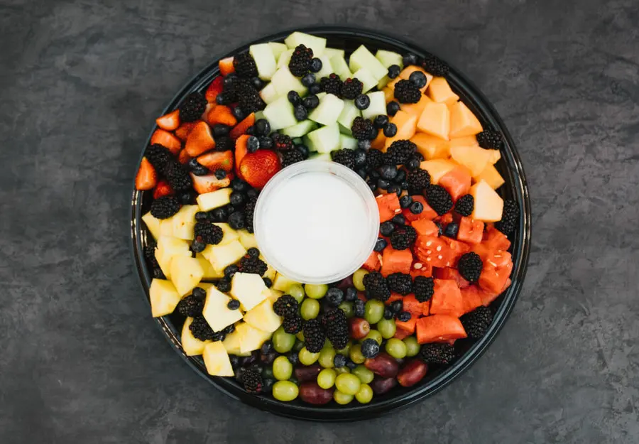 A fresh fruit platter arranged for cocktail hour