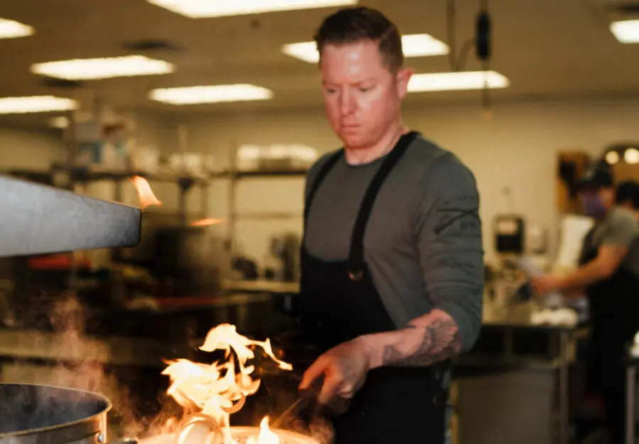 A Nameless Catering chef working the fire at an Indiana wedding